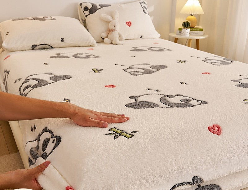 Bedding set with panda design on a bed, featuring antistatic and no lint properties.