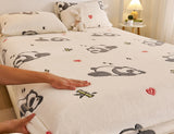 Bedding set with panda design on a bed, featuring antistatic and no lint properties.