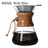 Wooden coffee maker with glass carafe and filter on a white background