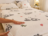 Bedding set with panda design on a bed, featuring antistatic and no lint properties.