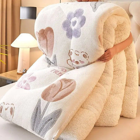 Floral-patterned pillow with soft texture held by a person in a cozy room.