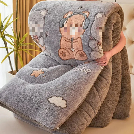 Fluffy blanket with cartoon bear design held by a person in a home setting.
