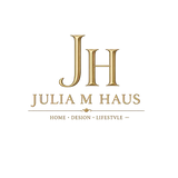 A gold-toned logo featuring the initials 'JH' above the text 'JULIA M HAUS' and the tagline 'HOME • DESIGN • LIFESTYLE', centered on a plain white background.