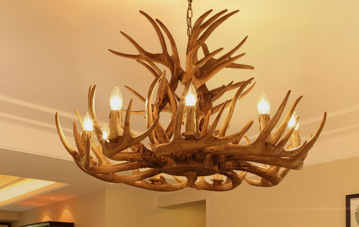 Antler chandelier with multiple lights in a room setting