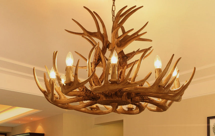 Antler chandelier with multiple lights in a room setting