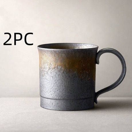 Vintage stoneware coffee cup made of pottery with rustic glaze and classic design