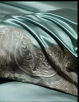 Luxury satin bedding set with intricate patterns on a dark background