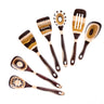 Set of ceramic kitchen utensils with brown and beige patterns on a white background