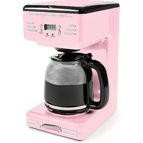 Pink coffee maker with a clear glass carafe on a white background