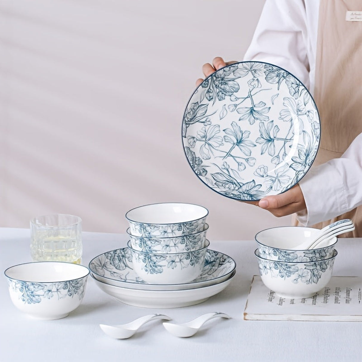 Set of ceramic dishes with floral patterns on a light background