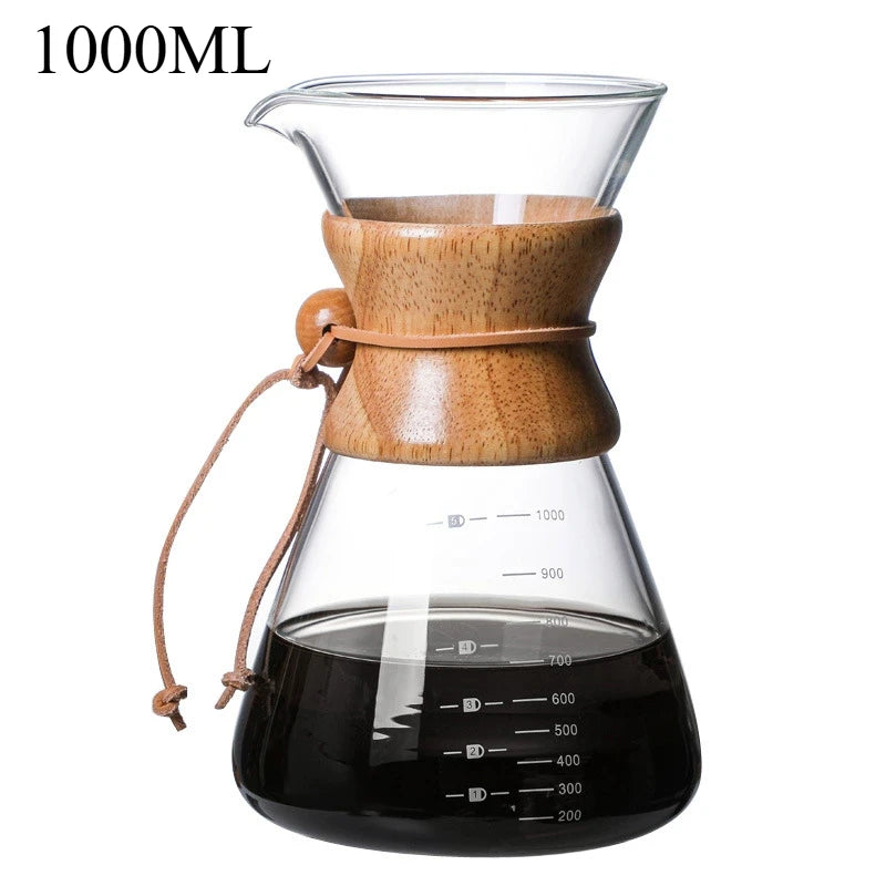 Glass coffee maker with wooden collar and black liquid inside, labeled '1000ML'.