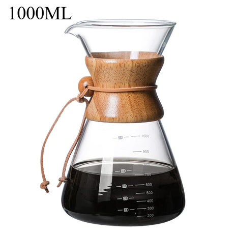 Glass coffee maker with wooden collar and black liquid inside, labeled '1000ML'.