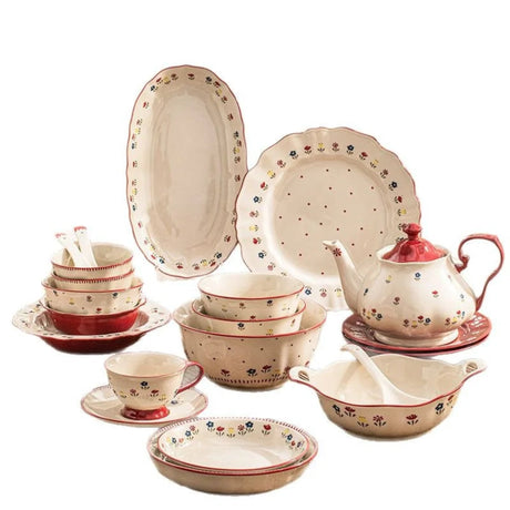 Ceramic dinnerware set with floral patterns on a white background