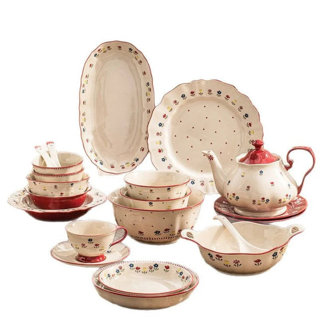 Ceramic dinnerware set with floral patterns on a white background