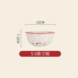 Ceramic bowl with floral pattern and measurements on a beige background