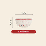 Measurement of a decorative bowl with floral patterns on a beige background