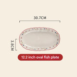 12.2 inch oval fish plate with dimensions on a beige background