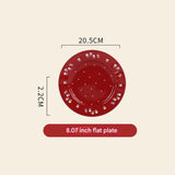 Red flat plate with floral patterns and measurements on a beige background